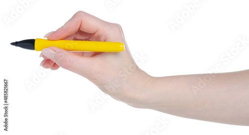 Construction yellow marker in hand on white background isolation