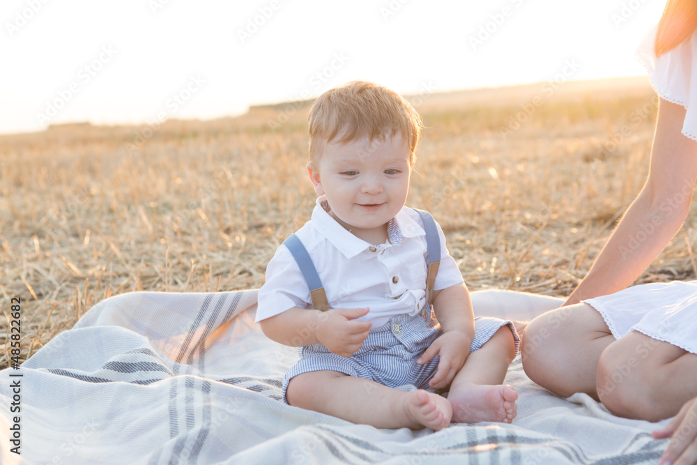 Mother and her son on holiday at a picnic. Mother and her son on holiday at a picnic.