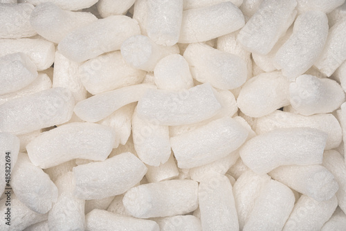 Full frame macro shot of white polystyrene packaging material in pellet shape