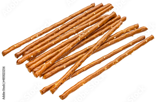 Stack of salted pretzel sticks isolated on white background