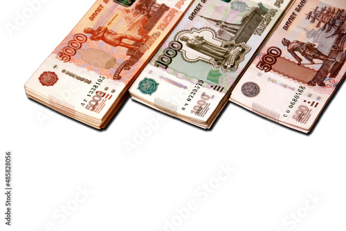 Isolates of banknotes of the Russian currency of different denominations on a white background, sanctions, exchange rate, wealth.