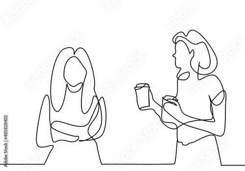 woman bringing coffee to her unhappy angry friend