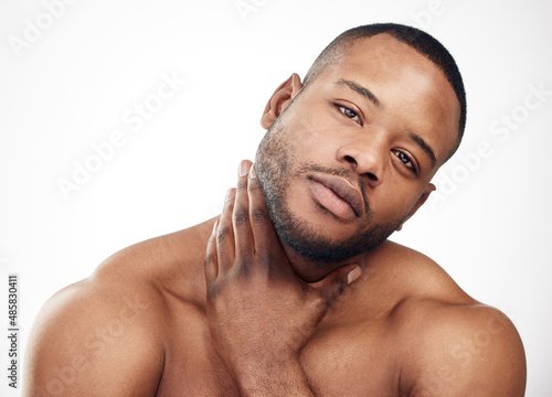 Well-groomed men are more likely to create lasting impressions. Studio portrait of a handsome young man posing against a white background.