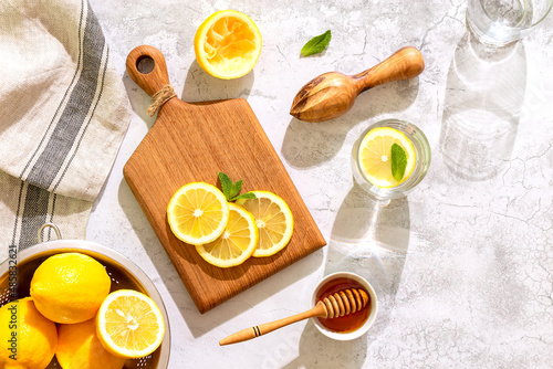 Refreshing homemade summer lemonade. Detox fruit infused water. photo