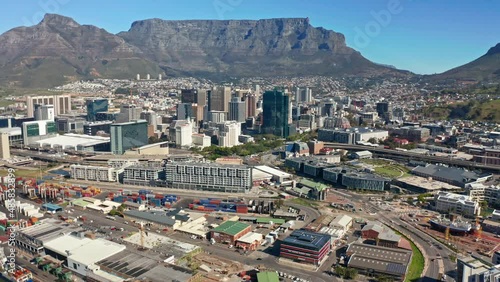 Wallpaper Mural Aerial shot above the harbor and slowly flying towards the city of Cape Town with the iconic Table Mountain as the backdrop behind the cityscape. Torontodigital.ca