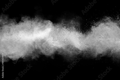 Explosion of white powder isolated on black background. Abstract colored background. holi festival.