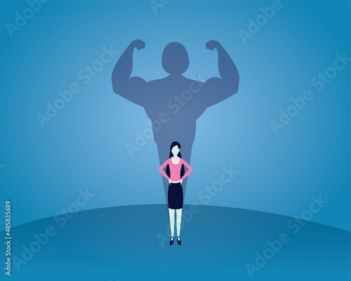 Fotografia Strong woman concept, businesswoman with strong big muscle shadow