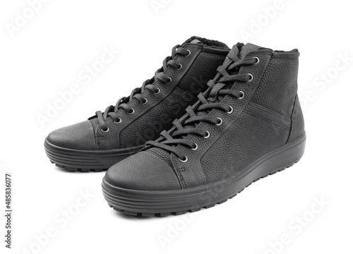 Men's sports leather boots on a white background. Men's sports winter boots with laces.