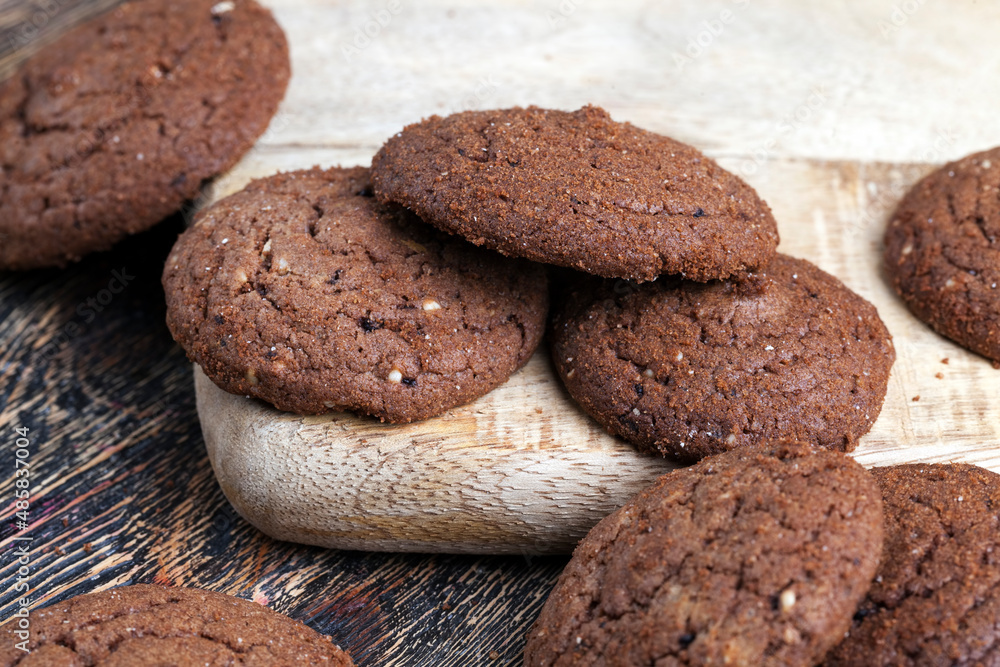 chocolate cookies on a wooden table chocolate cookies on a wooden table