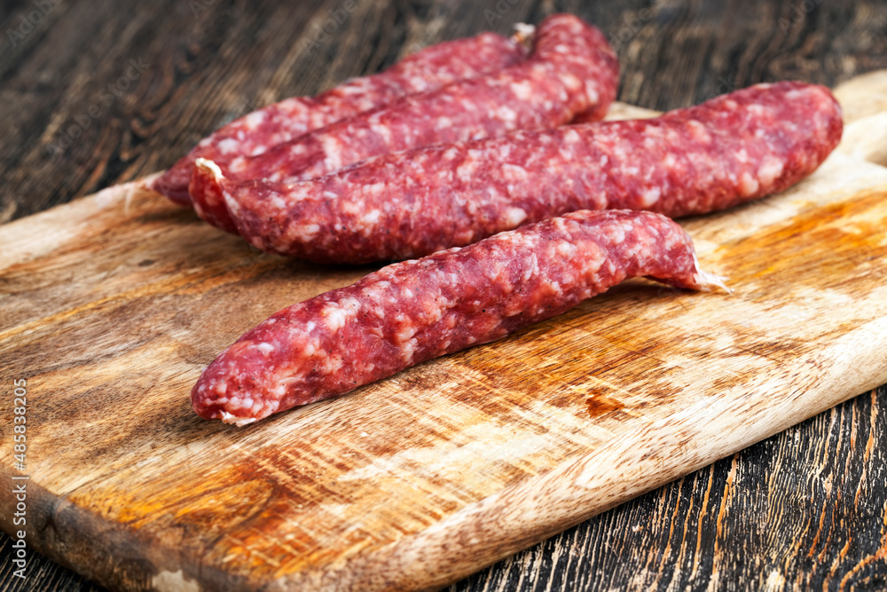 sliced sausage of dried meat with bacon sliced sausage of dried meat with bacon
