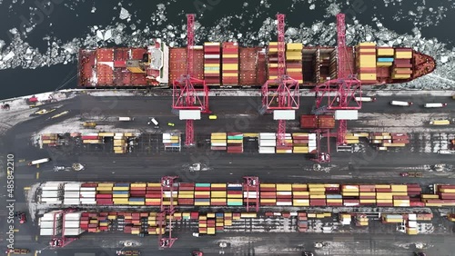 Ship being loaded of container at the Port of Montréal City