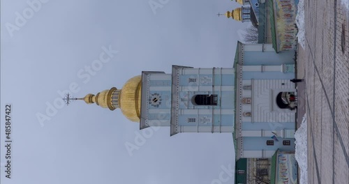 Day to night transition. Time lapse of St. Michael's Cathedral in Kiev, Ukraine. photo
