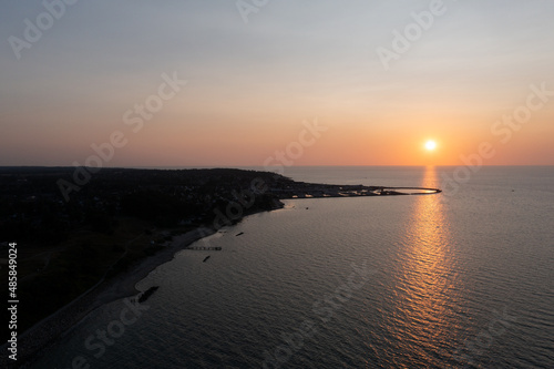 Gilleleje, Denmark - July 23, 2021: Aerial drone view of the silhouette of the local fishing harbour