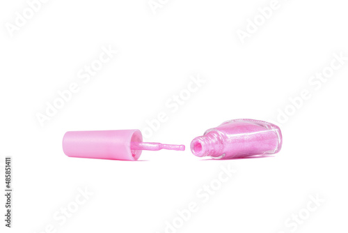 pink nail polish in a glass bottle