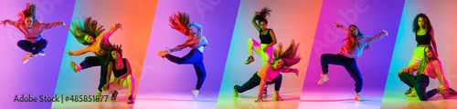 Two young girls, dancing contemporary dance on gradient pink purple background in neon. Collage photo