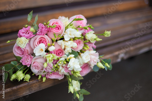 wedding bouquet on wooden background © Анна Минина