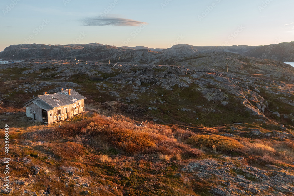 Abandoned house in the Murmansk region on the shores of the Barents Sea, the village of Teriberka