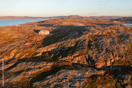 Aerial view of lake in tundra on the coastline of Barents sea  north of russia in autumn