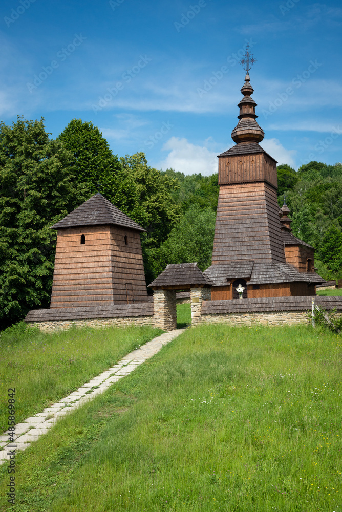 Fototapeta premium The Greek Catholic wooden church of St Paraskieva in a village Potoky, Slovakia