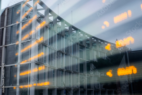 Building reflection with yellow lights