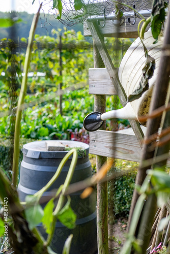 Watering can in garden