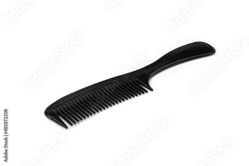 Black comb isolated on white background.