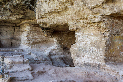 Rocky monastery with cells for monks. Background with copy space photo