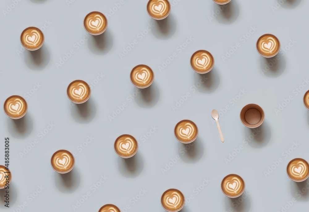 Repeating pattern of Eco-friendly disposable cup with heart shape latte coffee over gray background. Top view