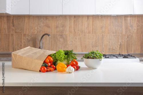 fresh vegetables on white table in kitchen