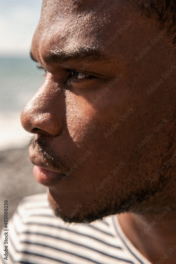 Close up profile african american man face staring Close up profile african american man face staring