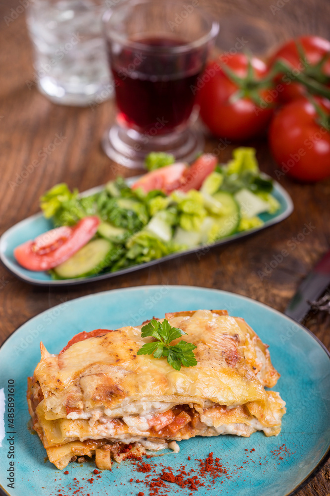 lasagna on a blue plate