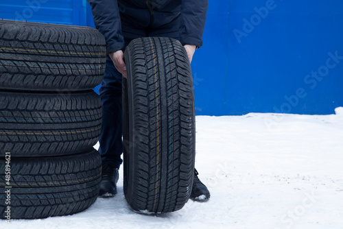 A set of summer tires for a car on the street.Replacement of car tires.
