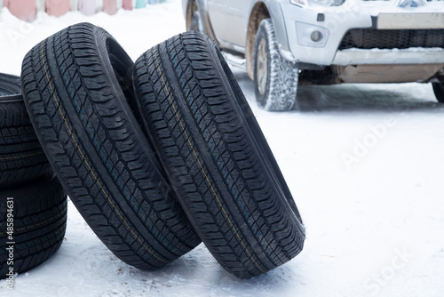 A set of summer tires for a car on the street.Replacement of car tires.