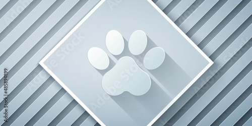 Paper cut Paw print icon isolated on grey background. Dog or cat paw print. Animal track. Paper art style. Vector