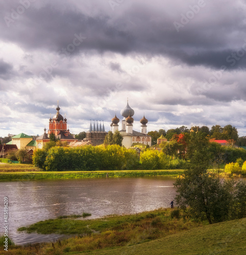 Panorama of the river and ancient Orthodox Tikhvin Bogorodichny Uspensky Male Monastery