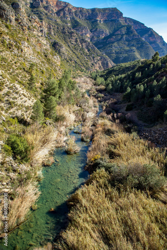  Top view of the river Júcar having made its way towards the mountains, at the height of the bridge that joins the towns of Millares and Dos Aguas