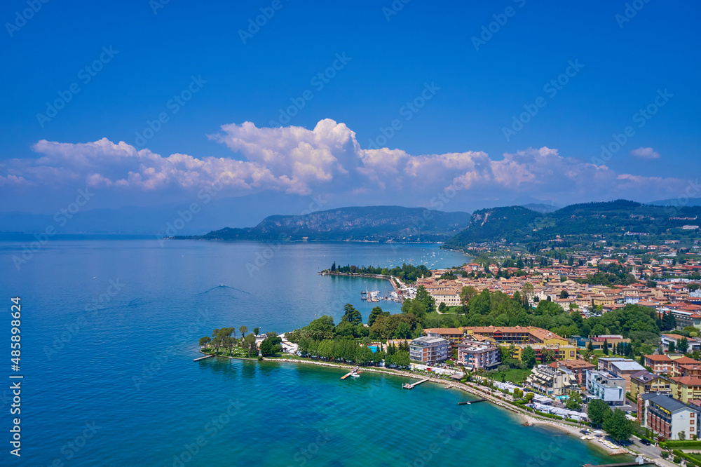In the city of Bardolino, Lake Garda is the north of Italy. View by Drone. Aerial photography. Aerial photography with drone. Beautiful coastline. In the city of Bardolino, Lake Garda, Italy.