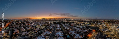 Drone panorama over the illuminated skyline of Las Vegas at night