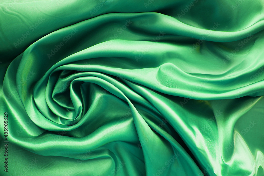 Fototapeta premium light green silk folds, top view