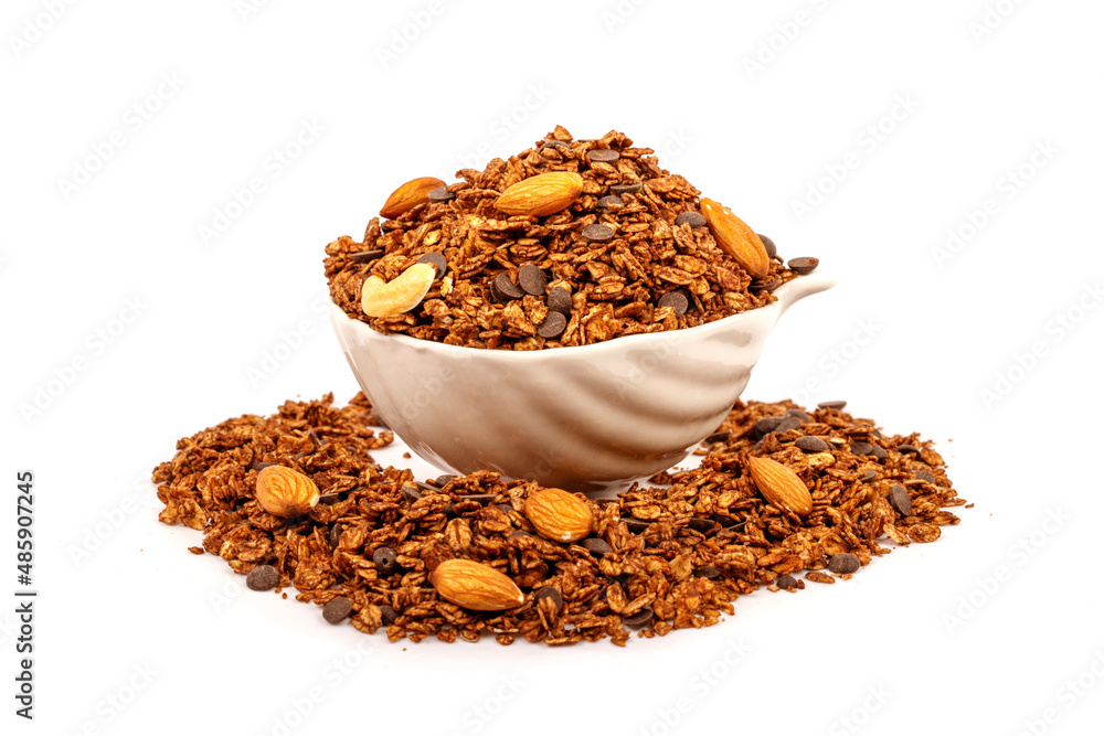 Nut Granola isolated on white background, copy space. Healthy snack or breakfast concept - homemade granola with grains and nuts. Nut Granola isolated on white background, copy space. Healthy snack or breakfast concept - homemade granola with grains and nuts.