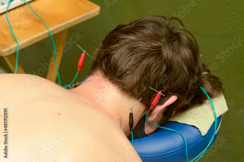 Relaxing muscle treatment with electric shock