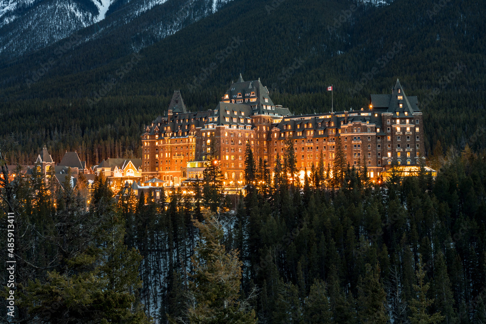 Obraz premium Banff Springs Hotel in winter. A historic landmark opened in 1888. Banff National Park. Canadian Rockies. 