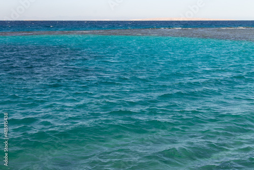 natural background blue color of ocean water © eevlada
