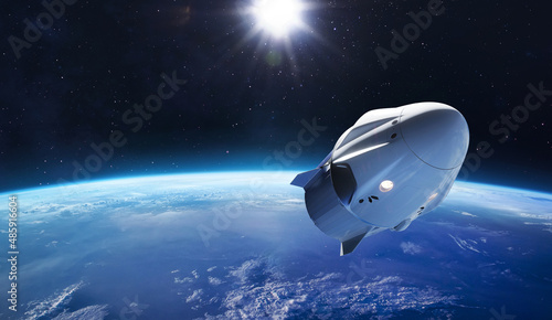 Fototapeta Naklejka Na Ścianę i Meble -  Spaceship flight from Earth. Space craft in space. Expedition to ISS. Sci-fi high quality wallpaper. Elements of this image furnished by NASA
