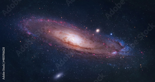 Bright spiral galaxy with stars in space. Galaxy Andromeda sci-fi  high quality space wallpaper. Elements of this image furnished by NASA
 photo