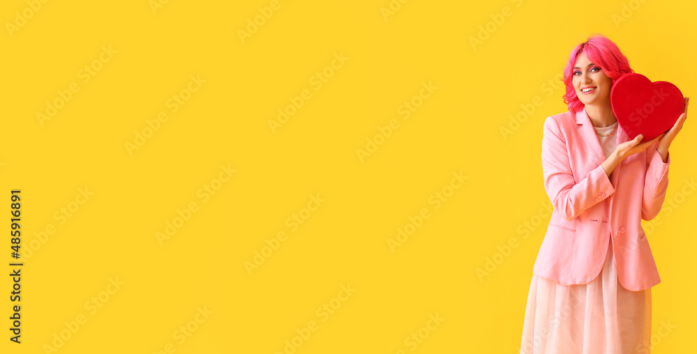 Stylish woman with bright hair and gift on color background with space for text. Valentine's Day celebration Stylish woman with bright hair and gift on color background with space for text. Valentine's Day celebration
