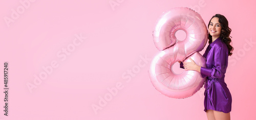 Smiling young woman with bi...