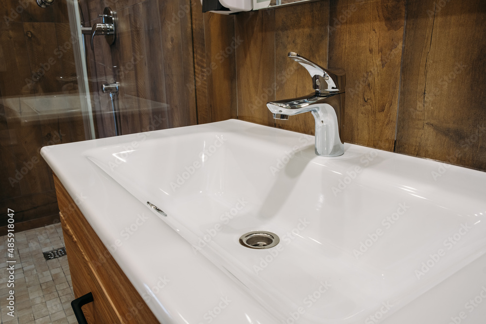 New white sink in hotel close-up. New white sink in hotel close-up.