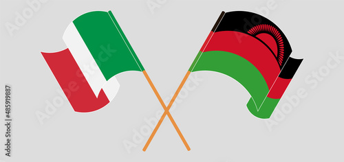Crossed and waving flags of Italy and Malawi