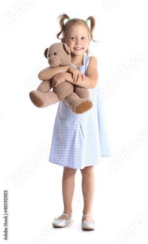 Adorable little girl holdin...